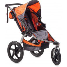 A stroller with an orange and black seat.
